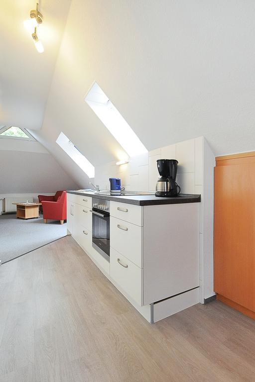 Pension Burggaststaette Heyken Neuharlingersiel Exterior foto